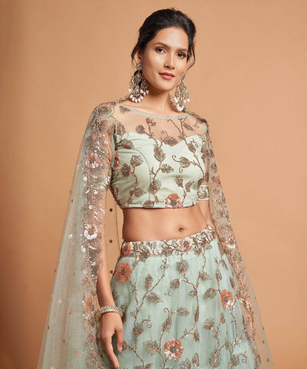 Pista Green Thread Embroidered Net Lehenga Choli