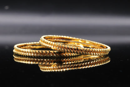 Set of 4 Gold-Plated Bangles and Bracelets