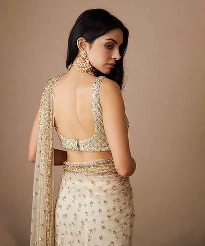Golden Glimmer Net Saree with a Subtle Sheen