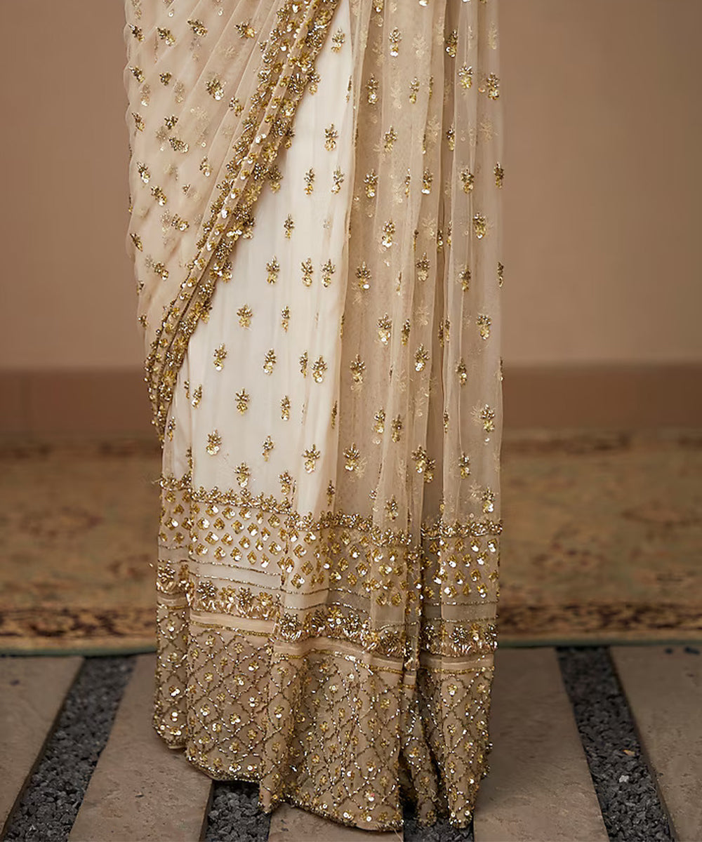 Golden Glimmer Net Saree with a Subtle Sheen