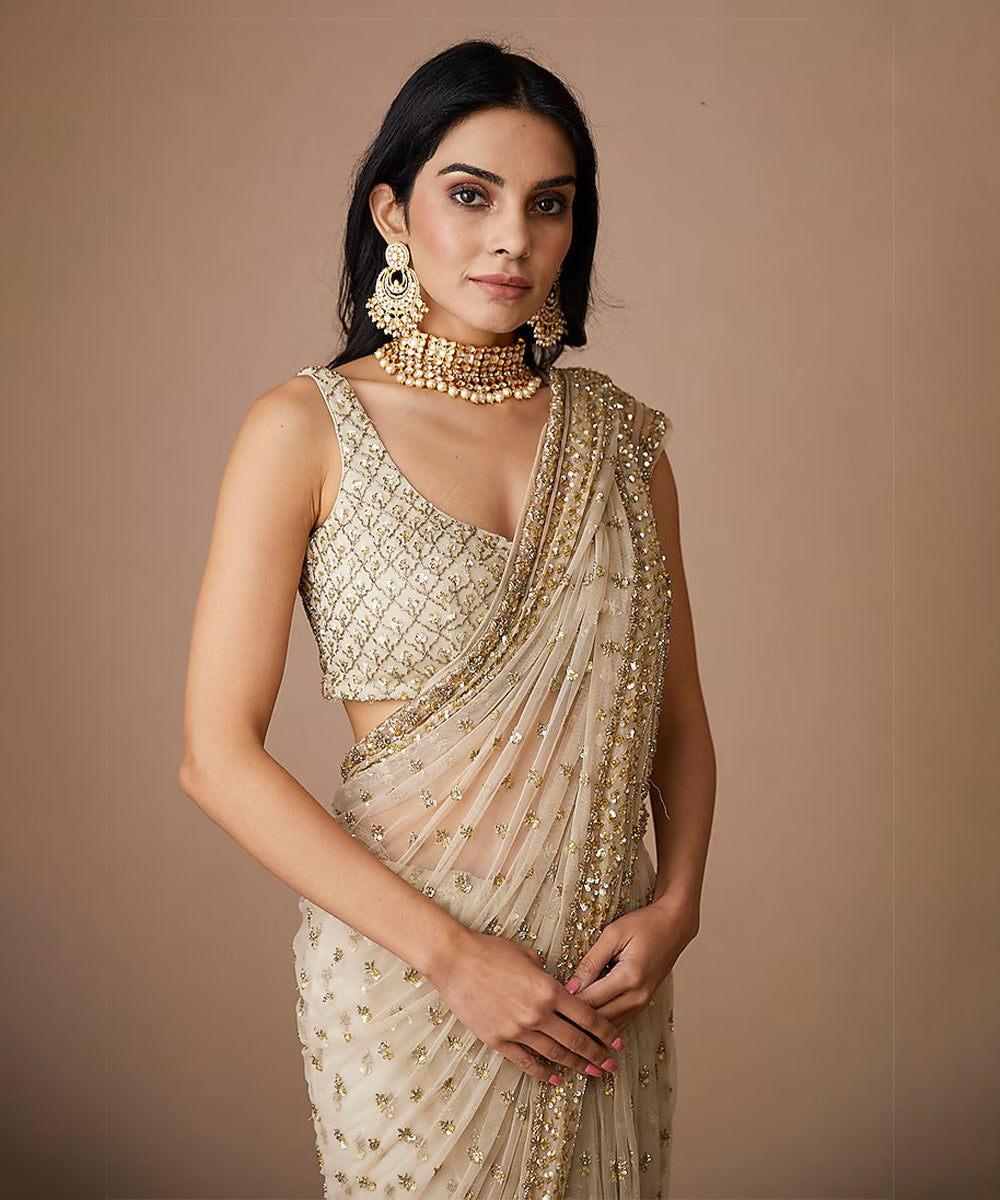 Golden Glimmer Net Saree with a Subtle Sheen
