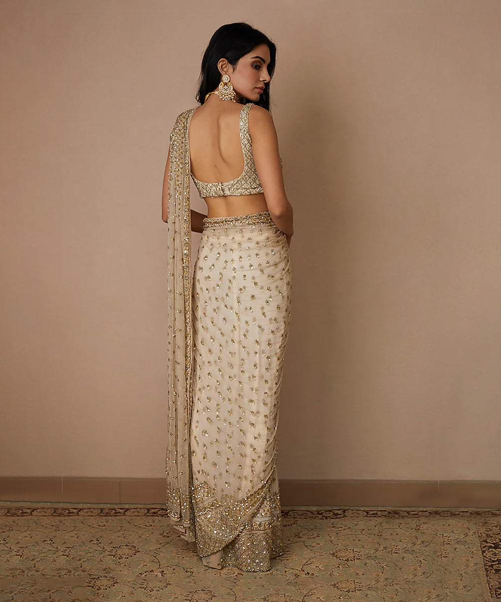 Golden Glimmer Net Saree with a Subtle Sheen