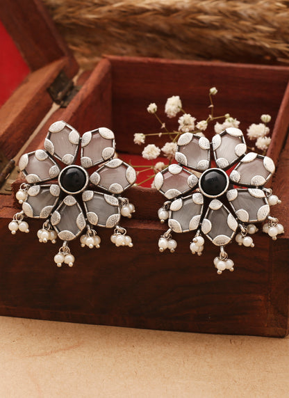 White Floral Shaped Earrings With Black Stone