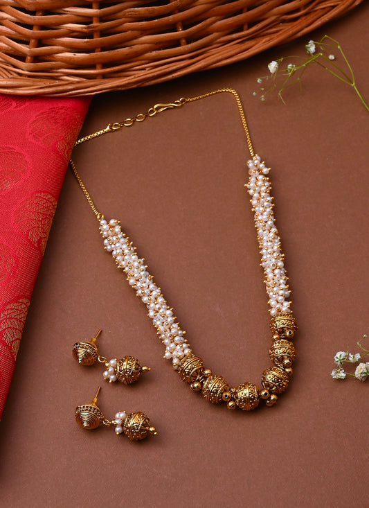 White Gold Beaded Jewellery with Golden Earrings