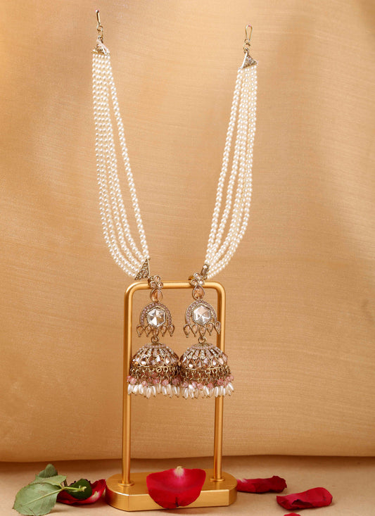 American diamond jhumkas with pearl ear chain and pink accents