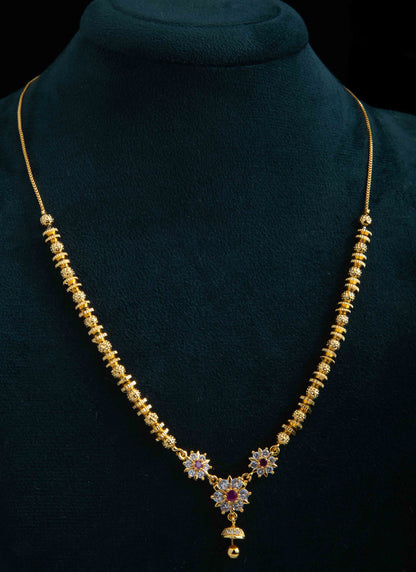 Gold Plated Ball Beaded Necklace with American Diamond Pendant