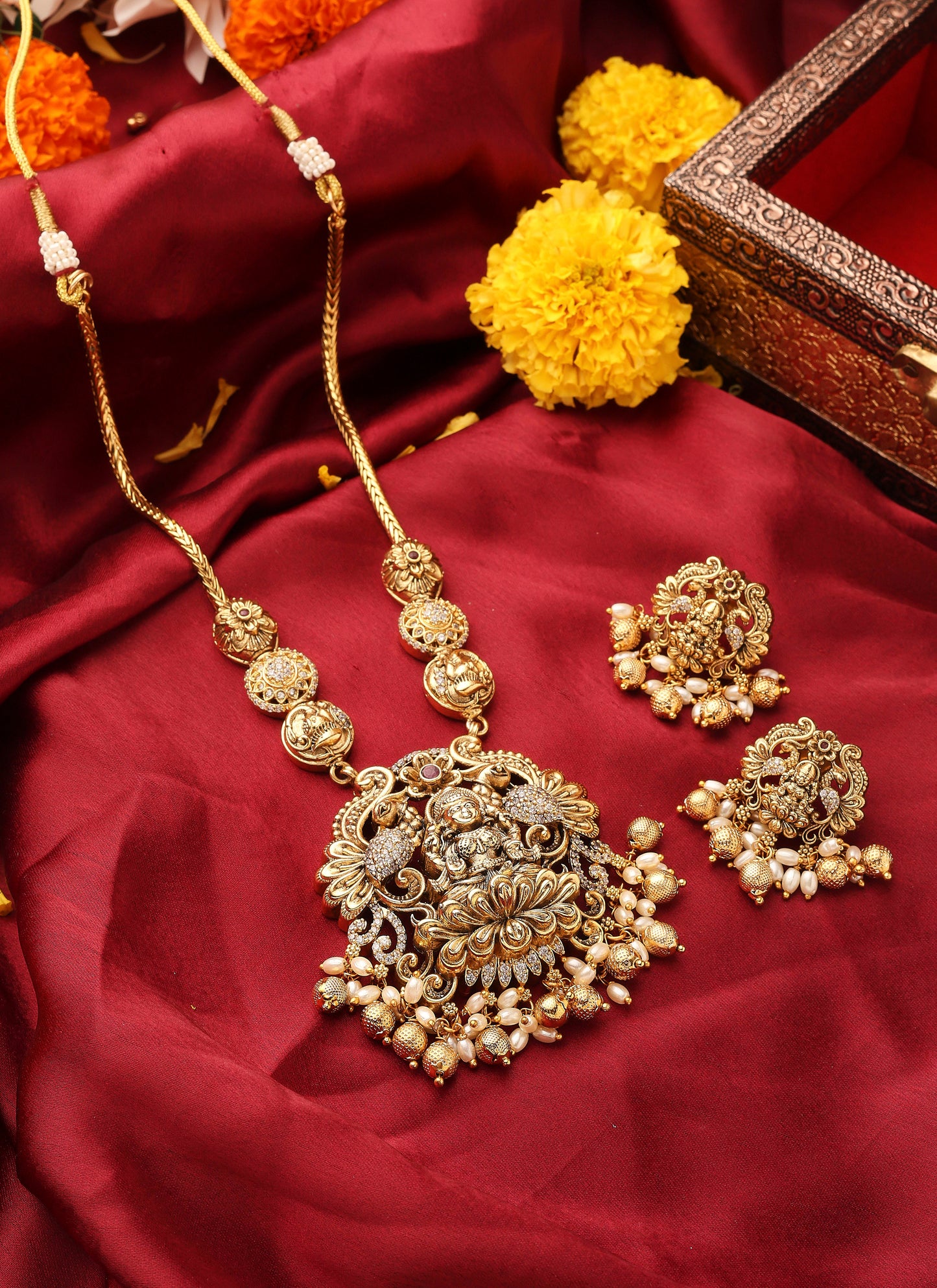 South Temple Style Gold Plated Necklace Set with American Stone Studded Lakshmi Motif Pendant