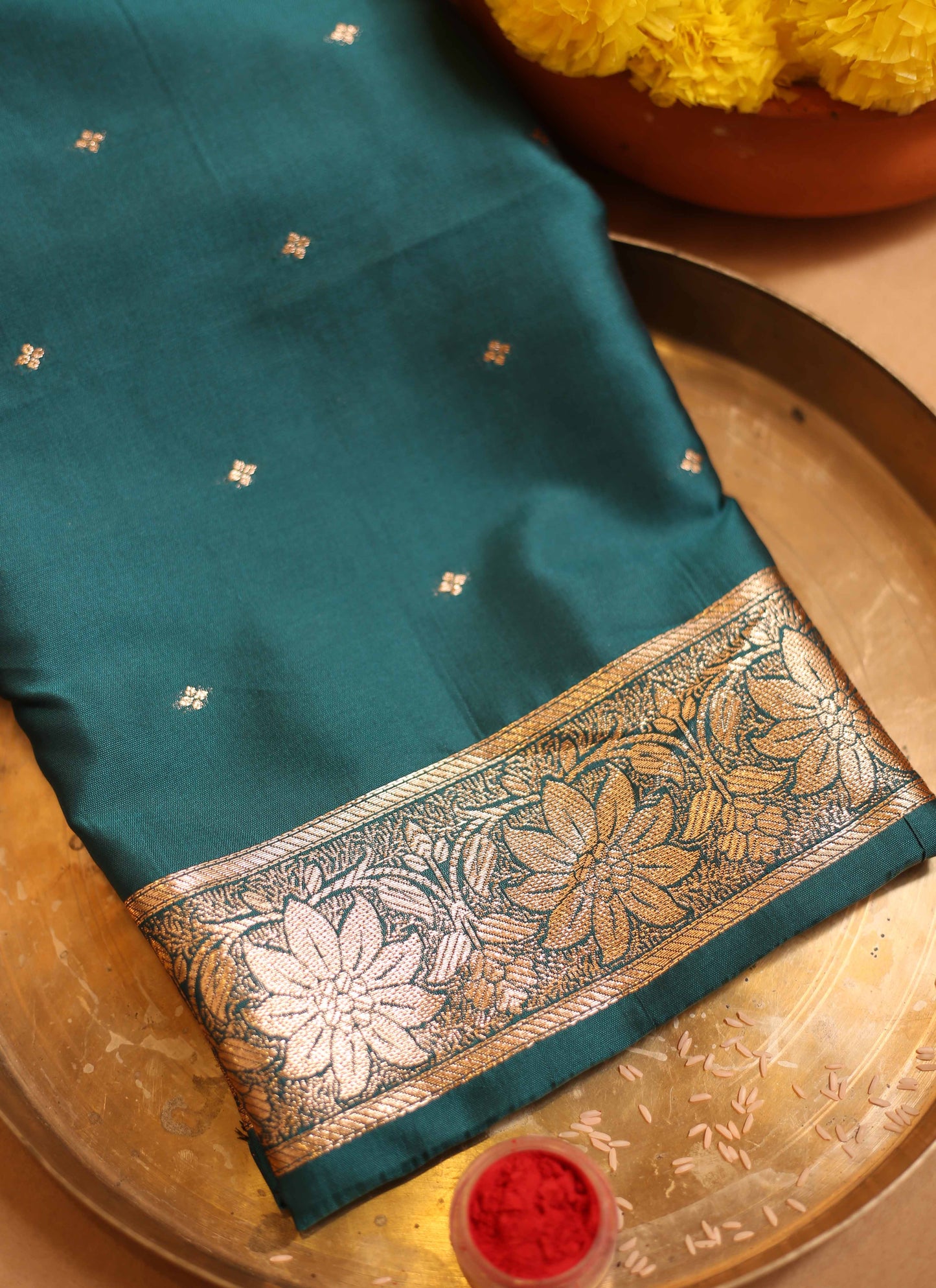 Teal Green Zari Woven Saree with Floral Border and Tassels