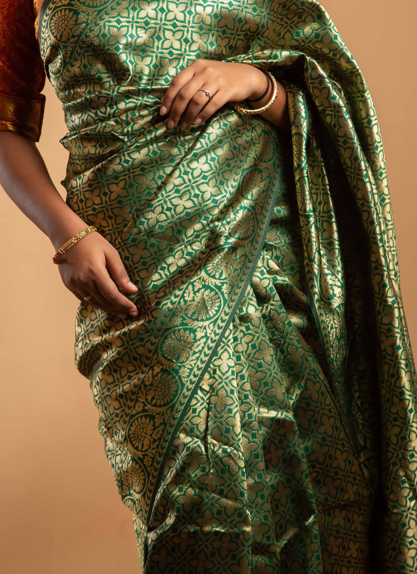 Green and Red Zari Woven Saree with Floral Motifs
