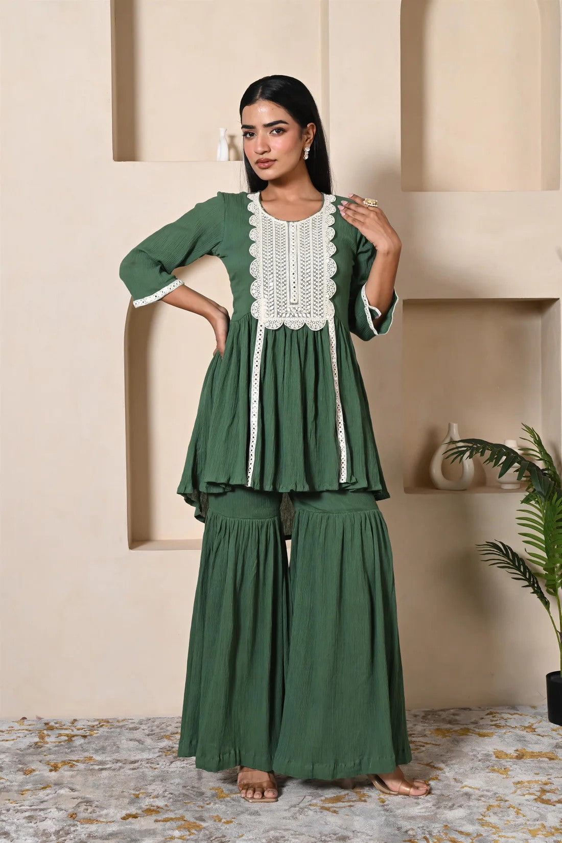 Green short kurta sharara set with heavy lace work for festival wear