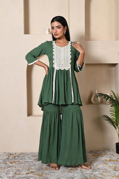 Green short kurta sharara set with heavy lace work for festival wear