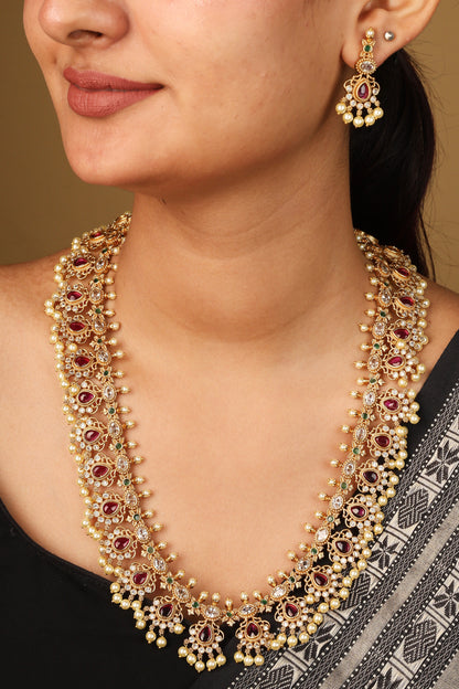 Elegant Guttapusalu Necklace with Tiny Jhumkis and Curved Detailing in Red Stones