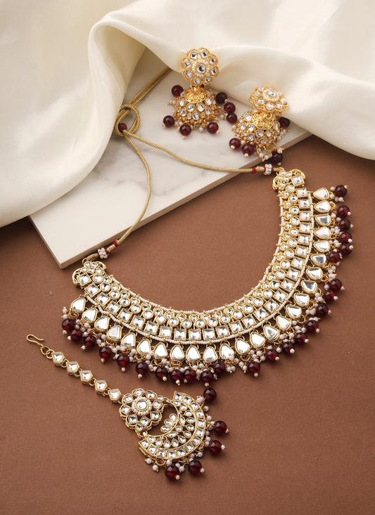 High Neck Kundan Necklace Set with Red Beads