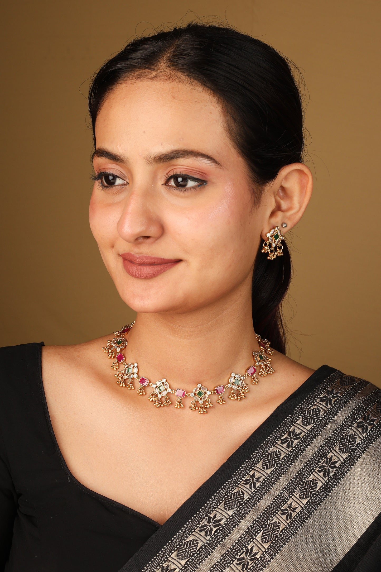 Elegant Red Stone Necklace with Curved Detailing and Matching Earrings