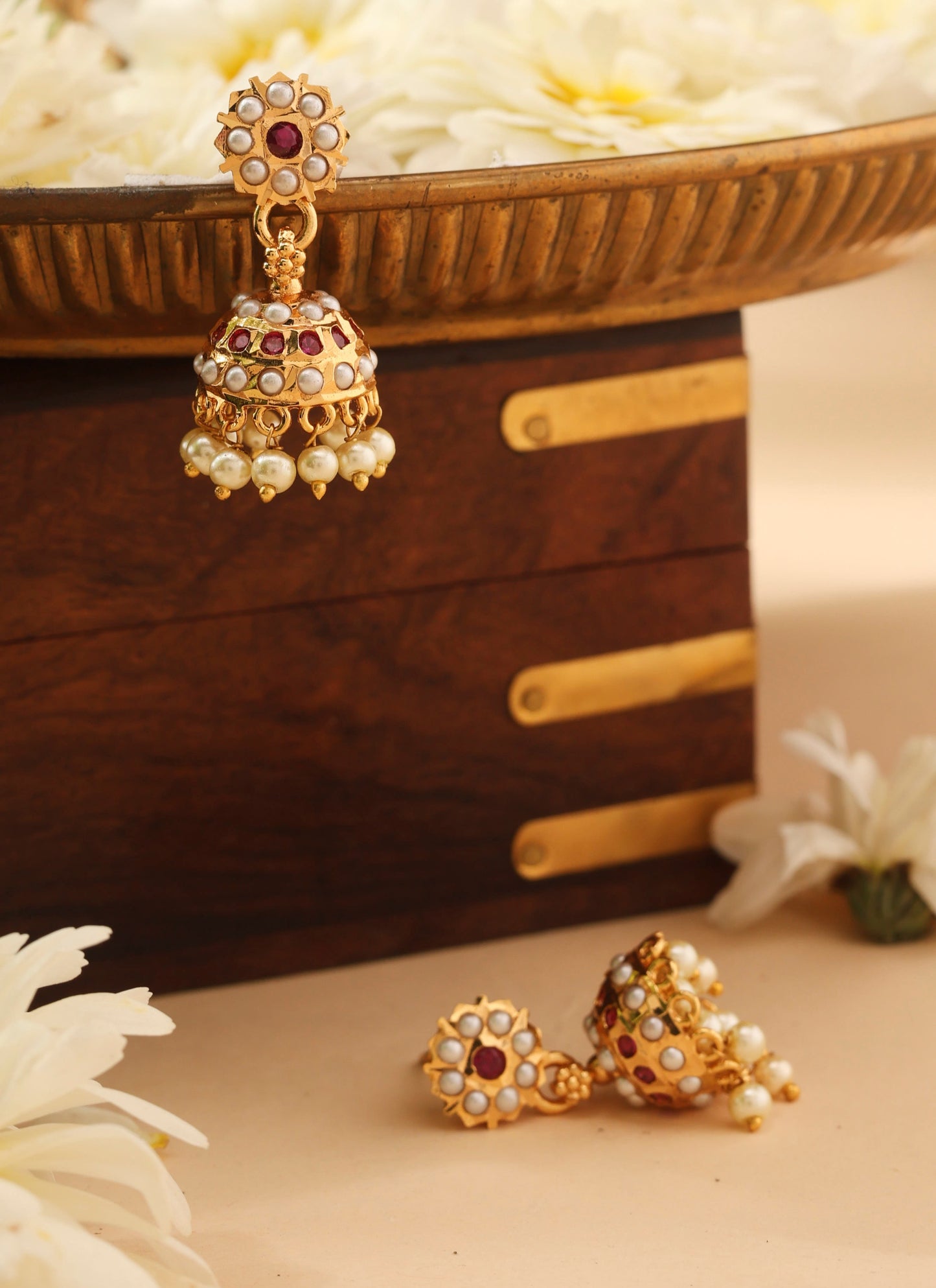 Gold Jhumkas with Pink and White Stone Accents