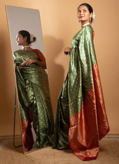 Green and Red Zari Woven Saree with Floral Motifs