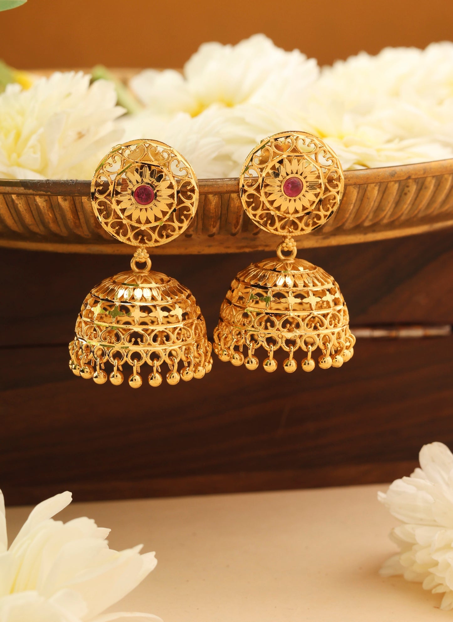 Gold Jhumkas with Intricate Detailing