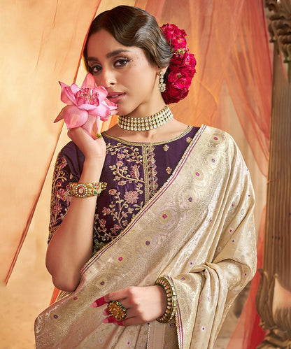Elegant Off-White Banarasi Silk Saree with Floral Zari Motifs