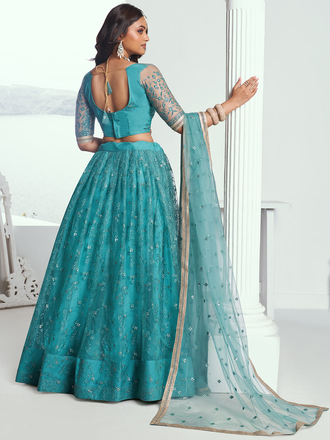 Stunning Rama Green Net Lehenga Choli with Embroidery