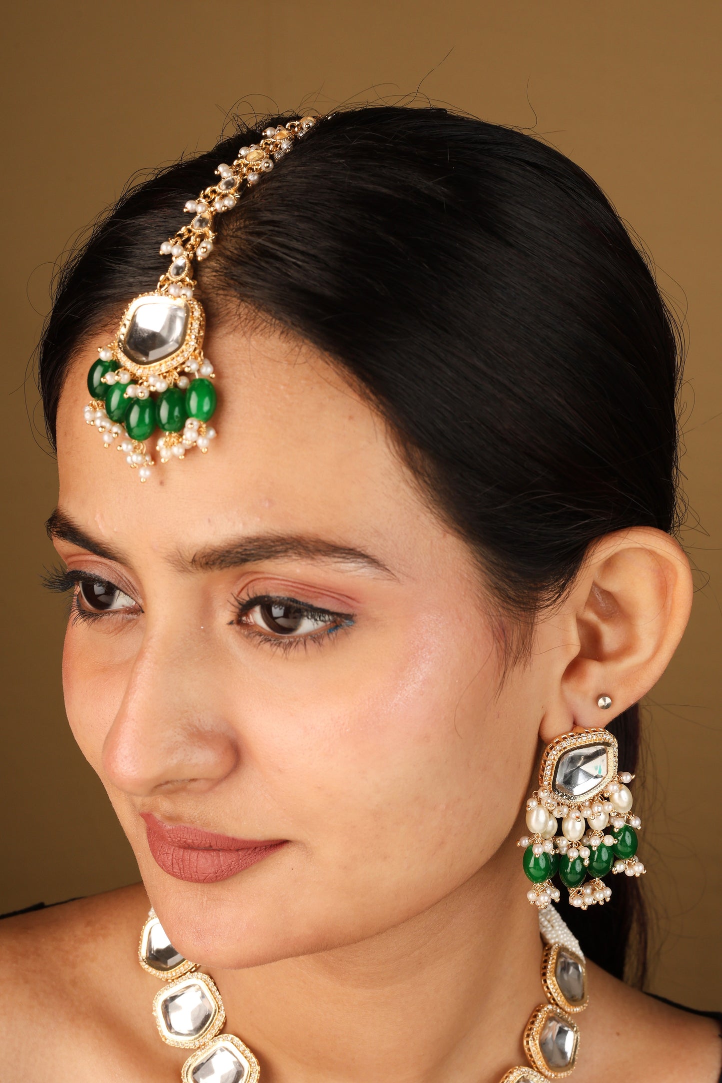 Necklace with Shapeless Transparent Kundan Stones and Dark Green Jhumkis