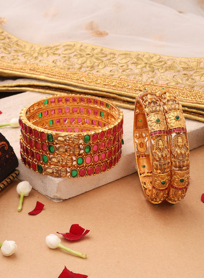 Goddess Radiance: Broad Gold-Plated Bangle with Intricate Motif and Gemstone Accents