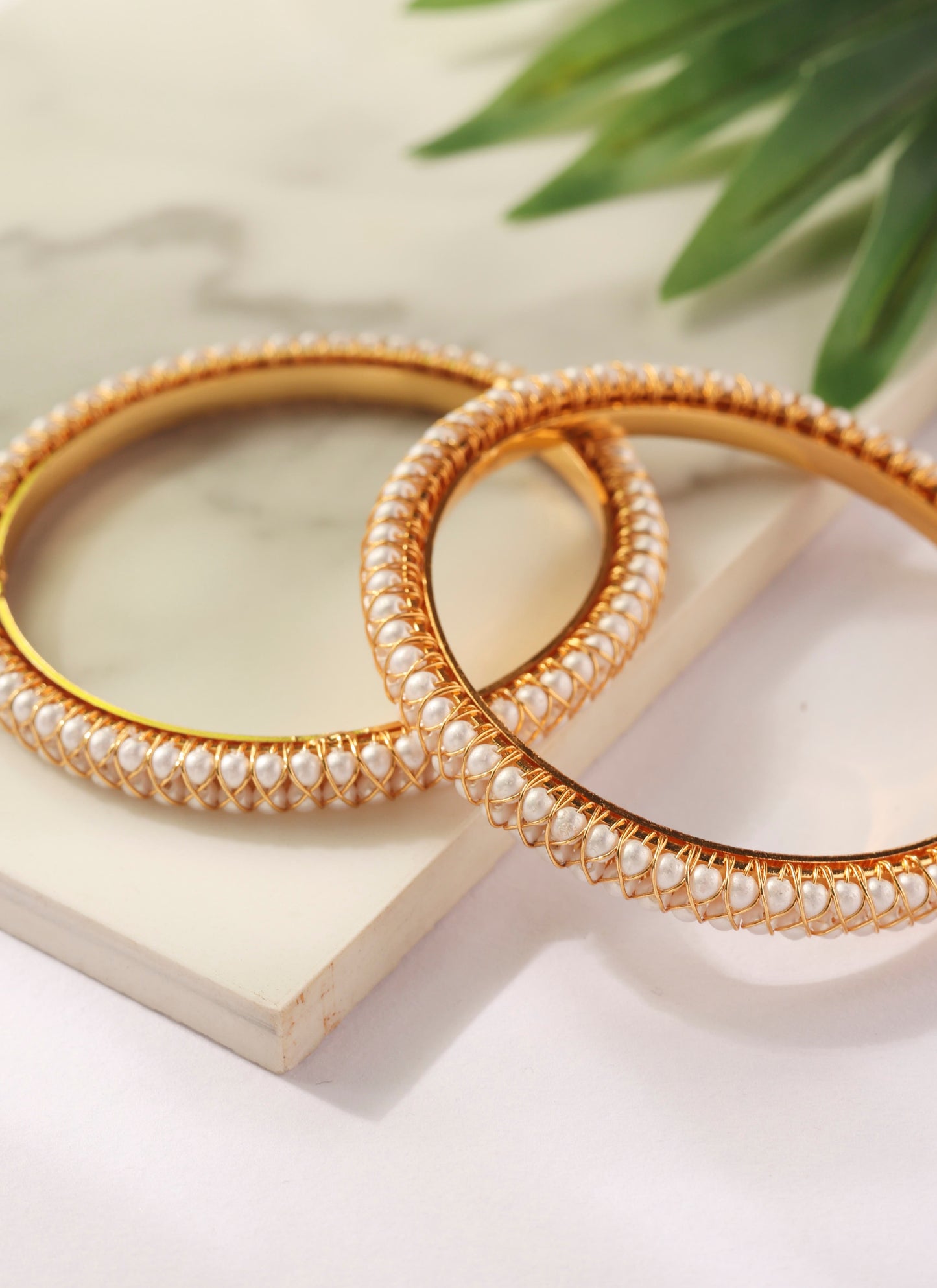 Set of two Gold Bangles with Pearl Detailing