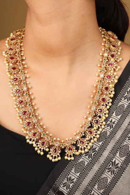 Elegant Guttapusalu Necklace with Tiny Jhumkis and Curved Detailing in Red Stones