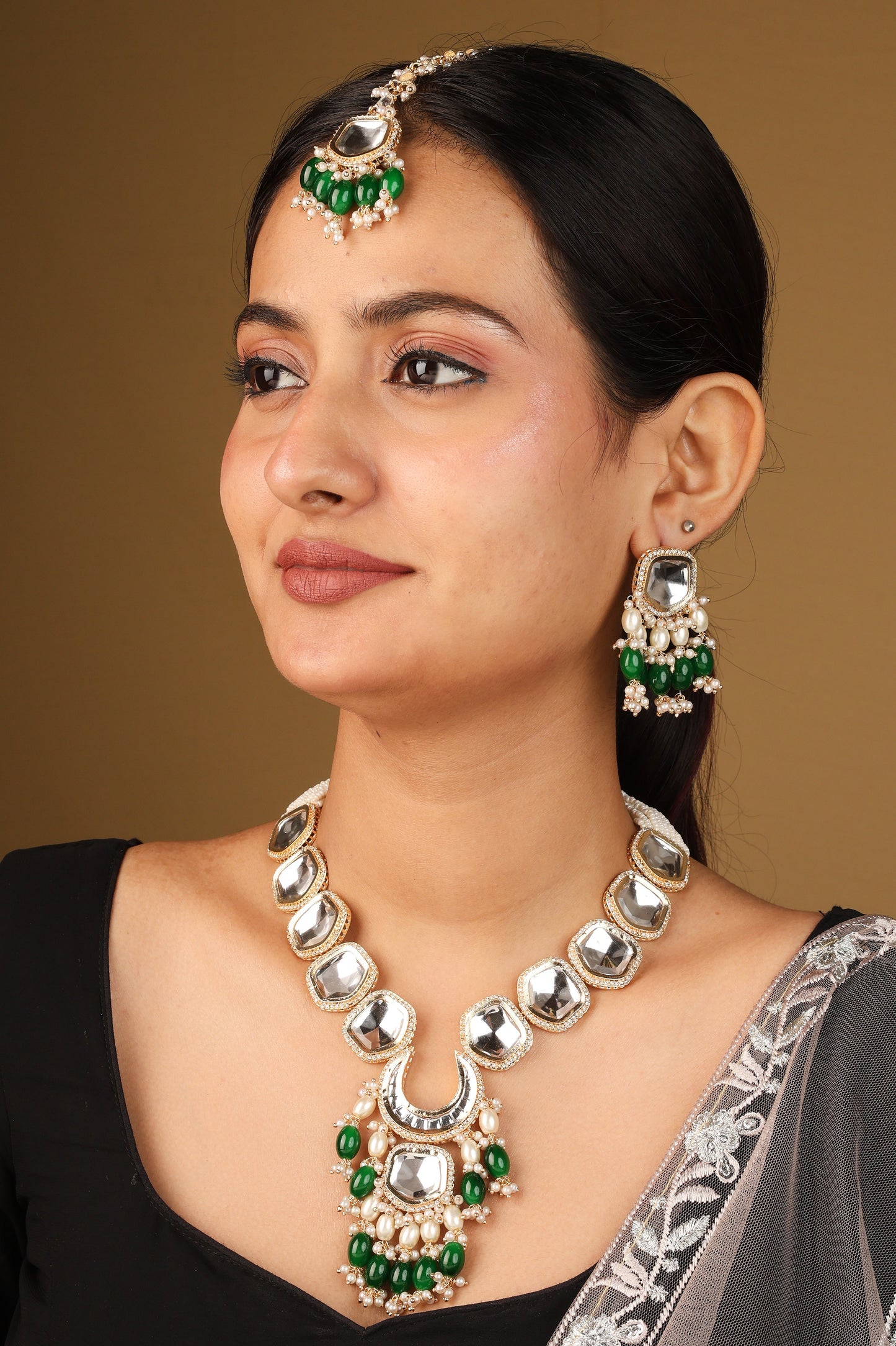 Necklace with Shapeless Transparent Kundan Stones and Dark Green Jhumkis