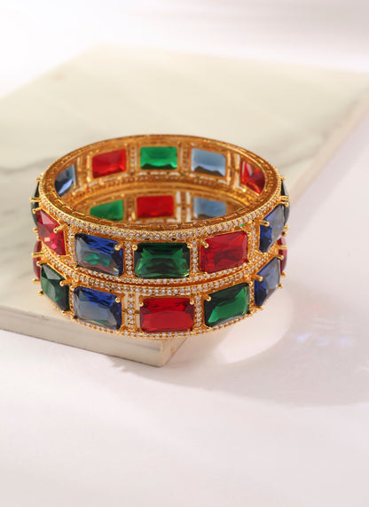 Set of two Gold Bangles with Green, Red and Blue Rubies