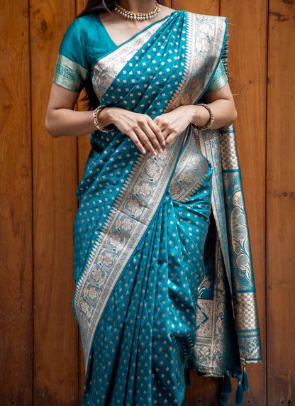 Teal Green Zari Woven Saree with Floral Border and Tassels