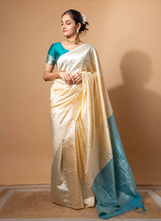 Ivory and Teal Zari Woven Saree with Intricate Motifs