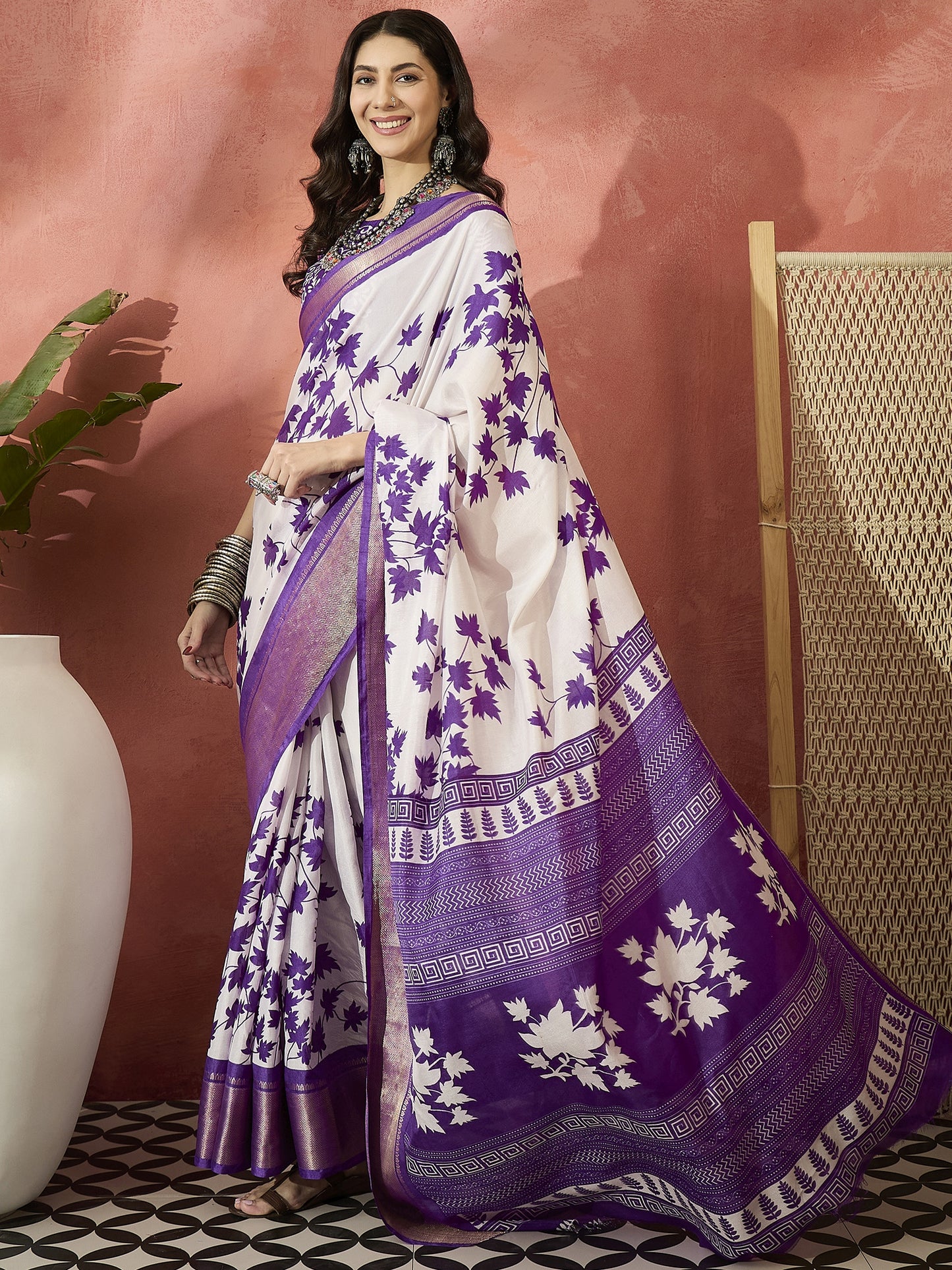 Elegant White Saree with Graceful Purple Floral Motifs