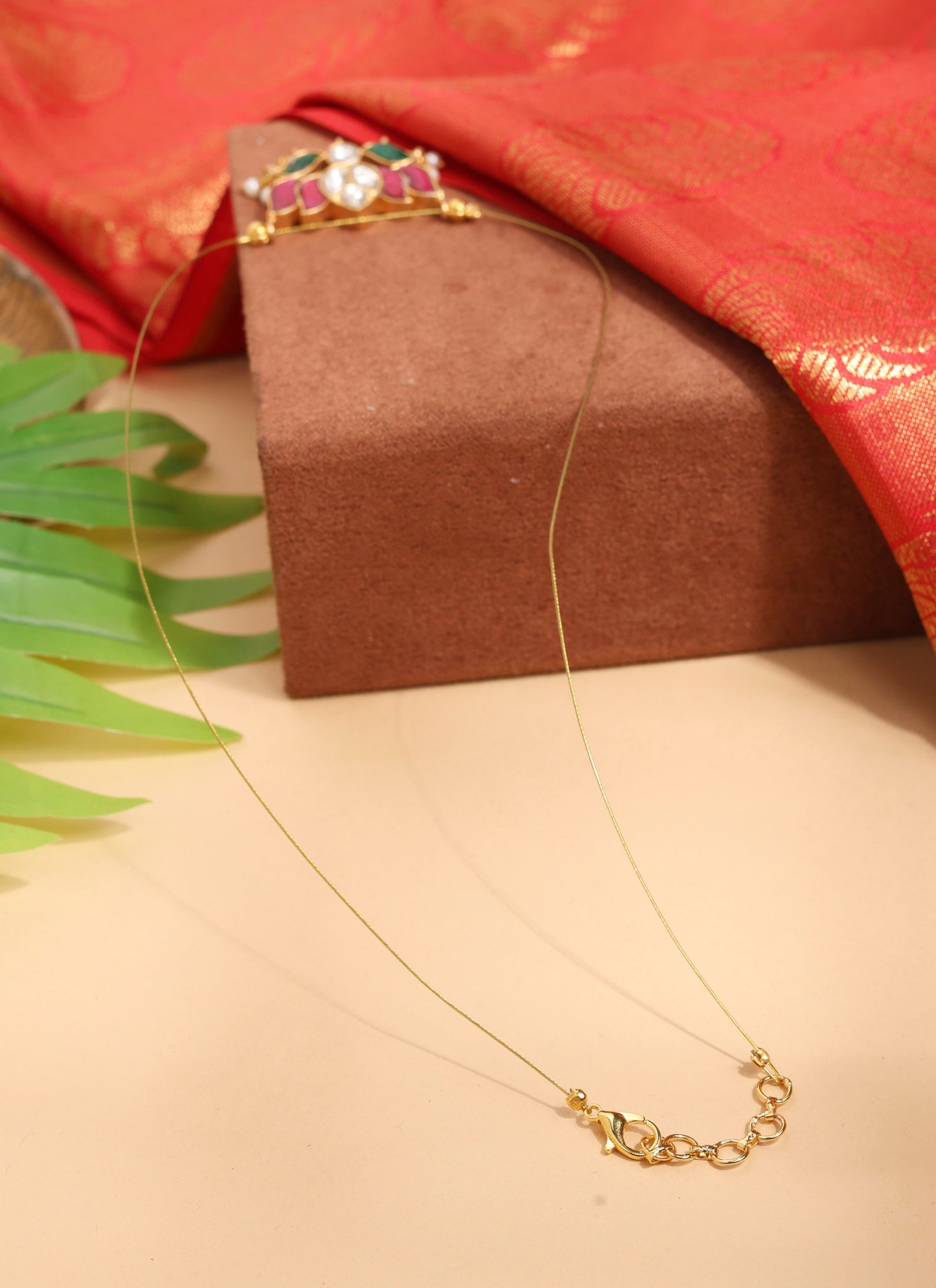 Graceful Gold Invisible Chain with Lotus Pendant