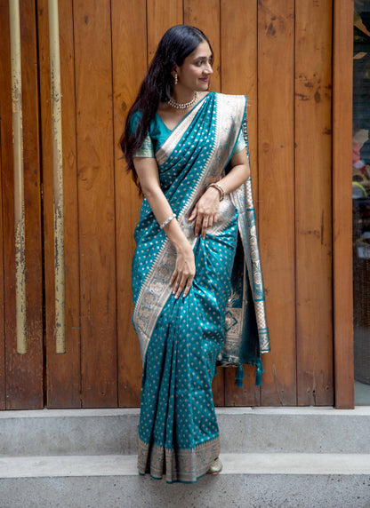 Teal Green Zari Woven Saree with Floral Border and Tassels