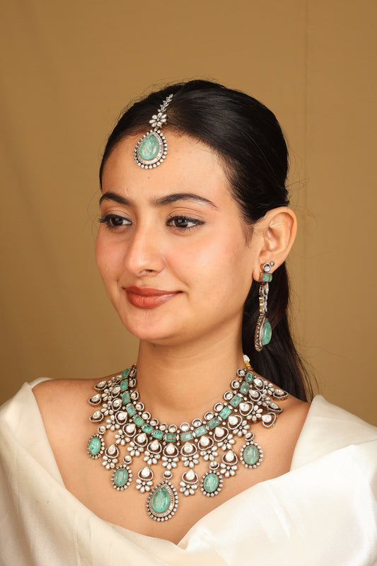 Majestic Kundan Choker Set with Green Stone Detailing