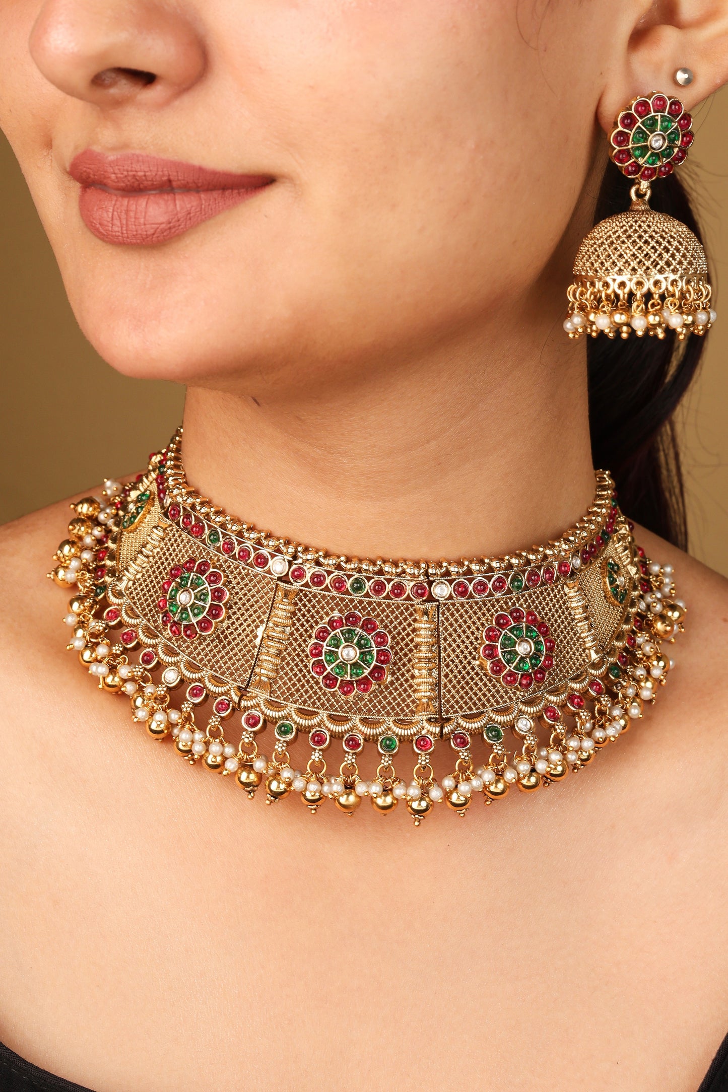 Ancient Style Curved Gold Plated Necklace with Intricate Carvings and Beaded Earrings