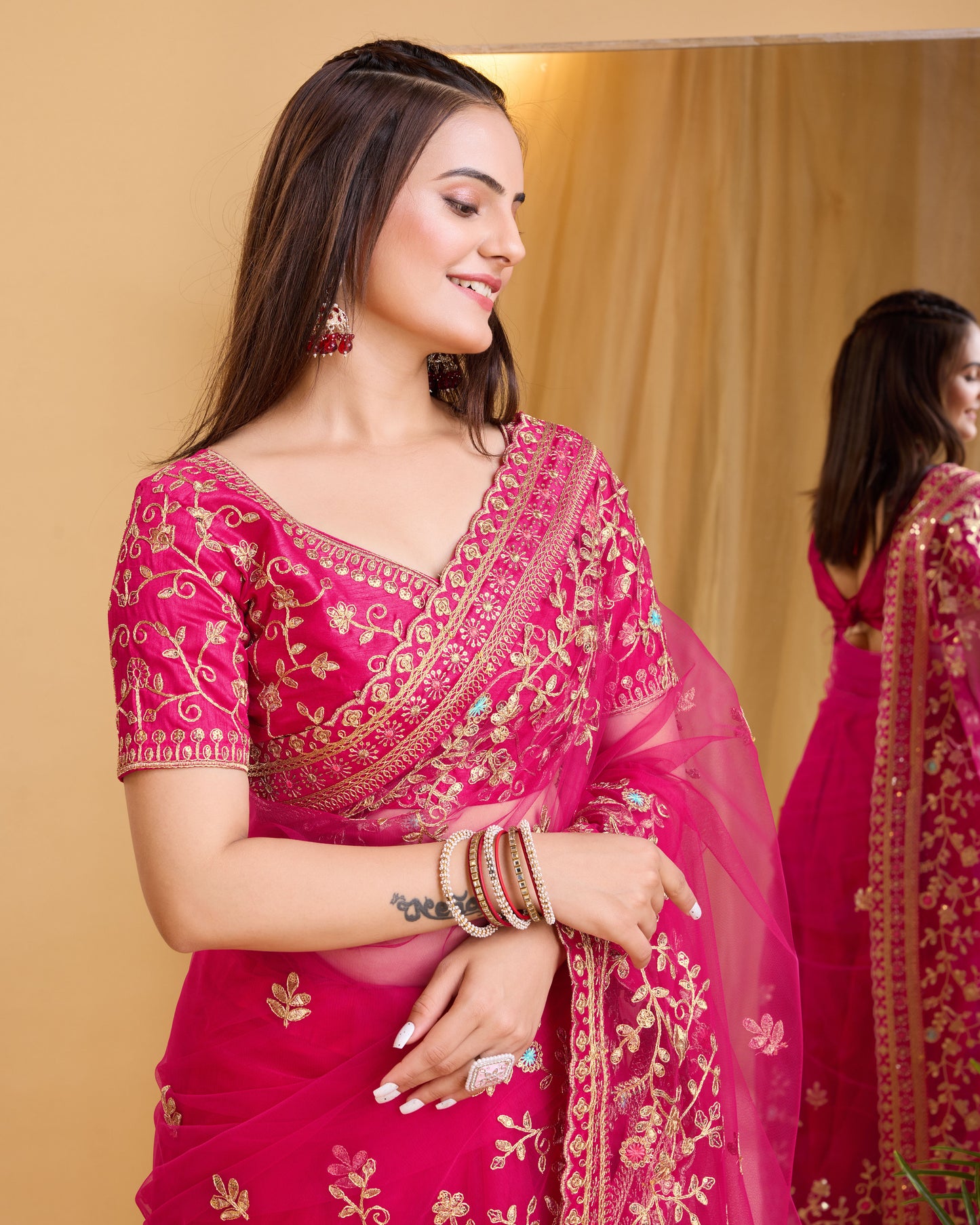 Rani Pink Soft Net Embroidered Saree