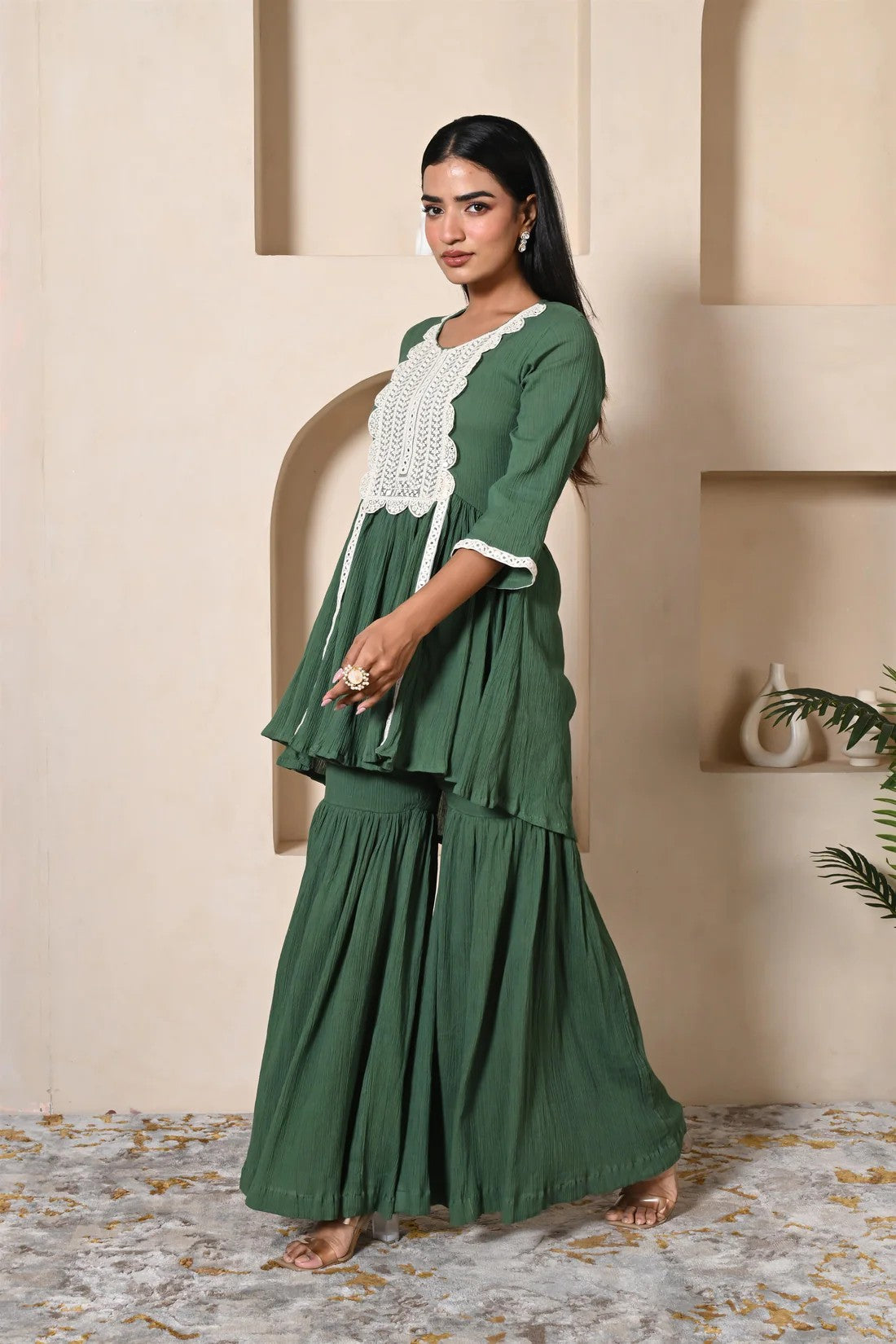 Green short kurta sharara set with heavy lace work for festival wear