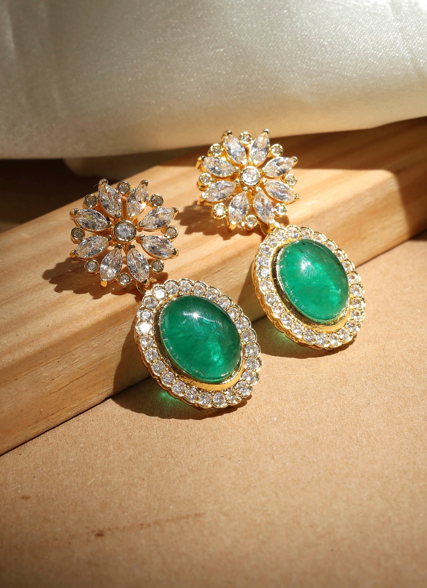 Elegant Kundan Earrings with Green Stones