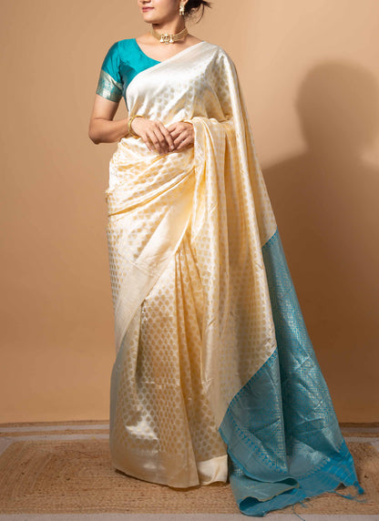 Ivory and Teal Zari Woven Saree with Intricate Motifs