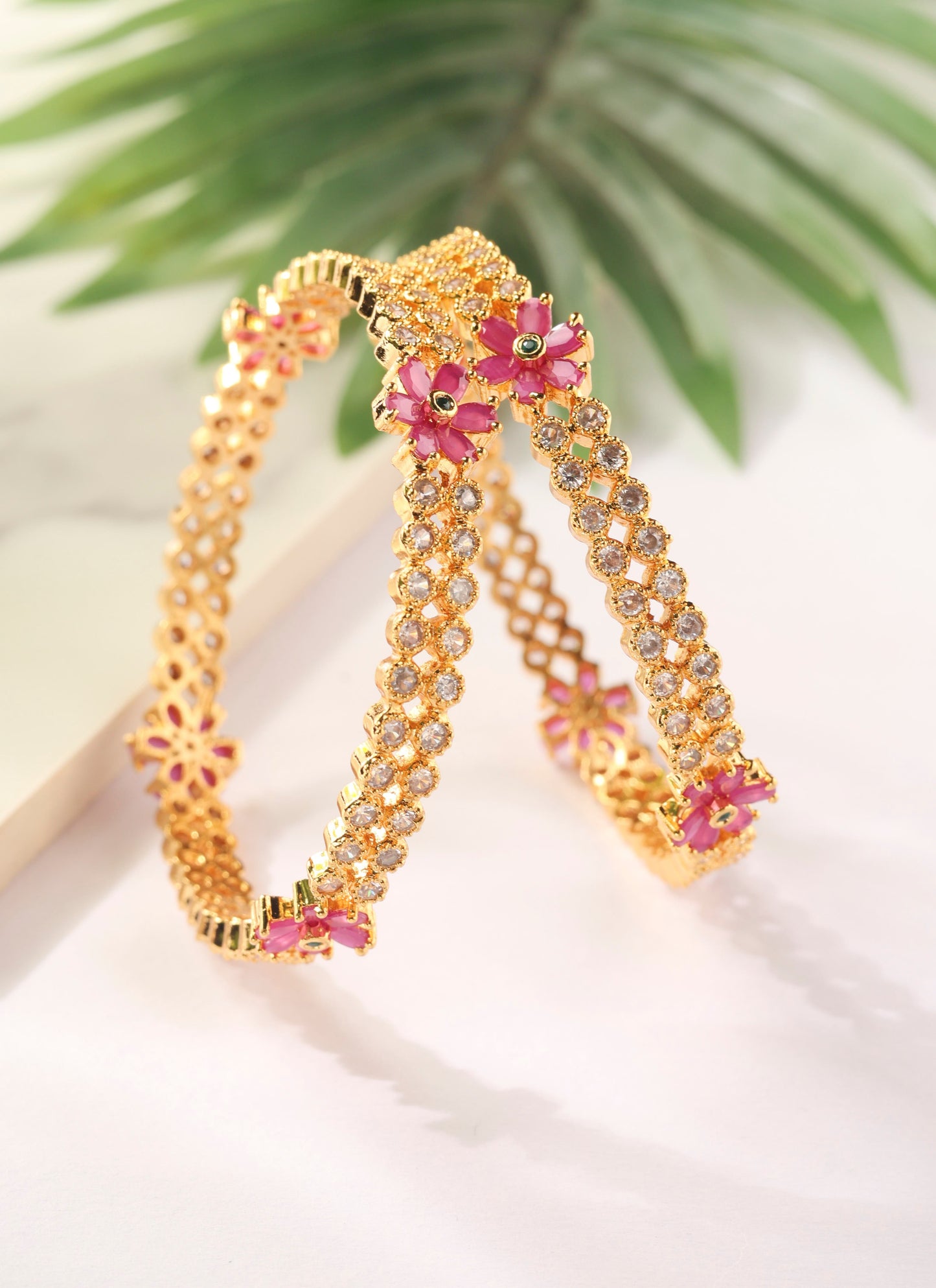 Set of two Gold Bangles with American Diamonds and Pink Stone Flowers