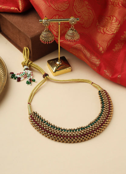 High Gold Necklace Set with Pink Stones and Matching Jhumkas