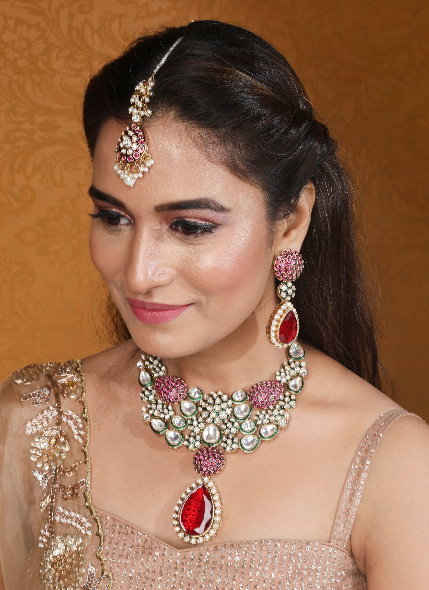 Jaipur Jadau Work Necklace Set with Red Stones Earrings and Maang Tikka in Kundan