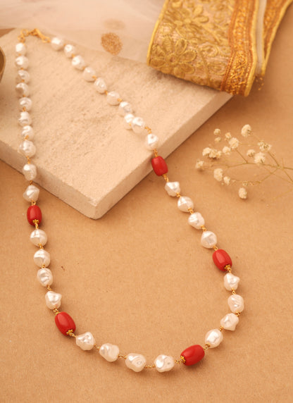 Natural Elegance: Necklace of Shapeless White Pearls with Orange-Red Accents