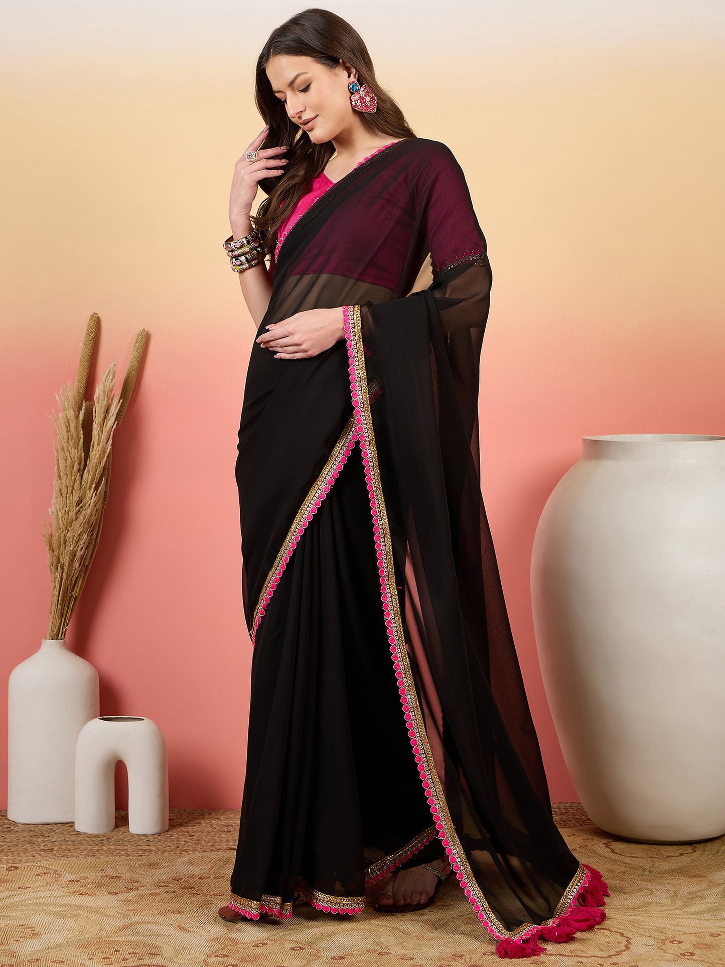 Classic Black Georgette Saree with Vibrant Pink Blouse