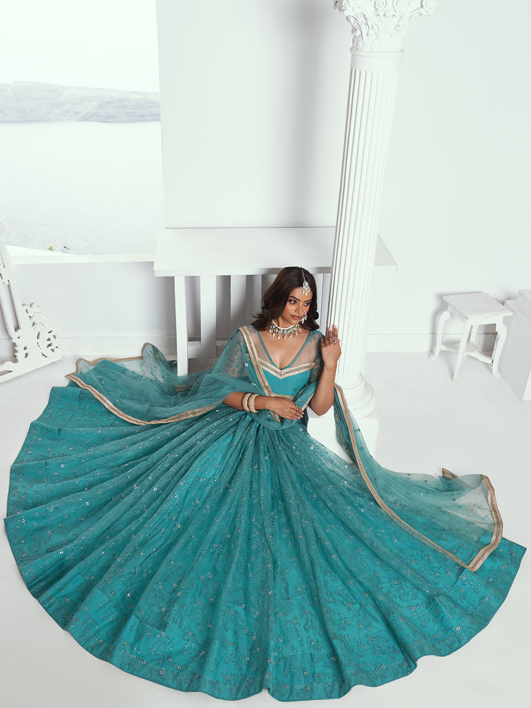 Stunning Rama Green Net Lehenga Choli with Embroidery