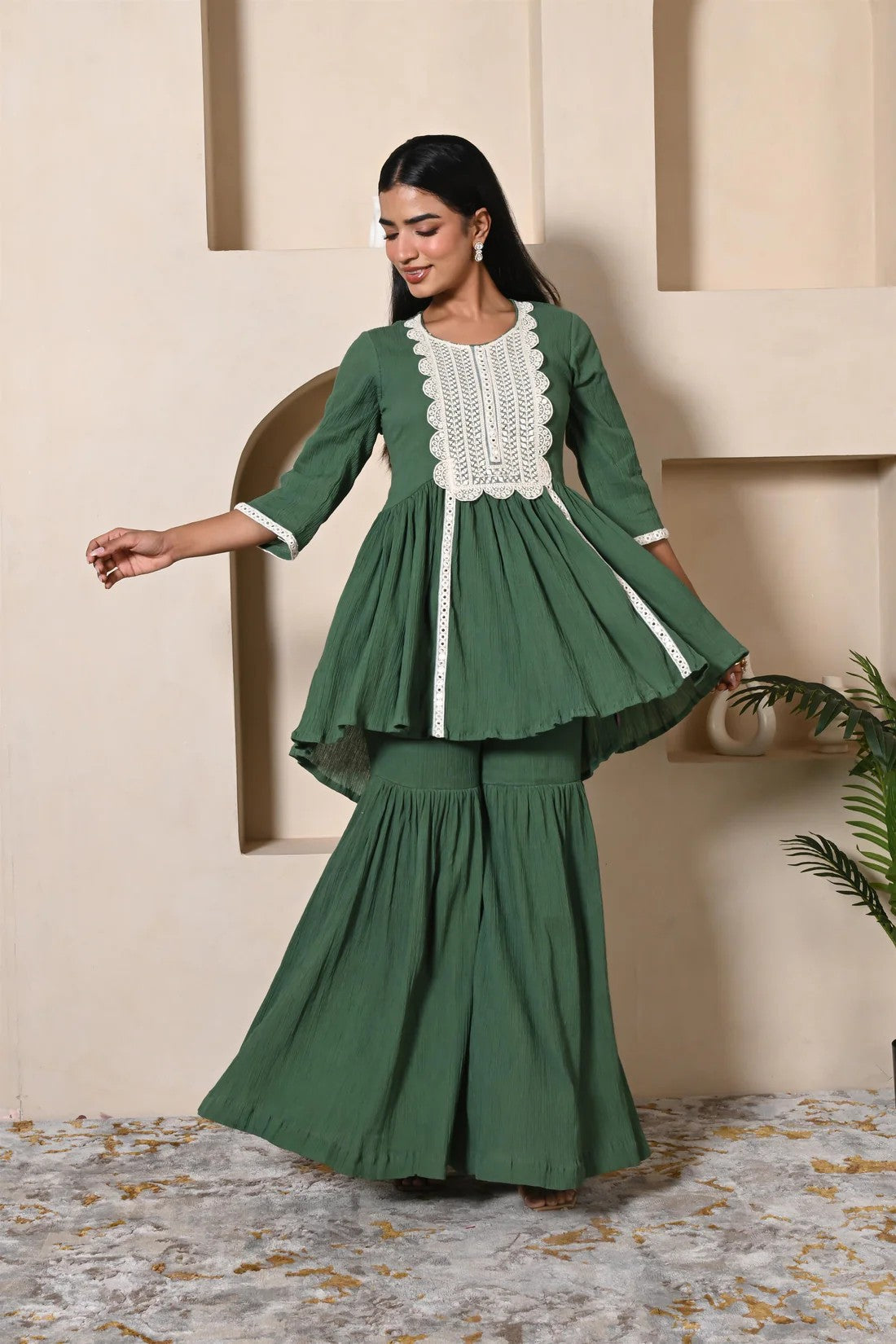 Green short kurta sharara set with heavy lace work for festival wear