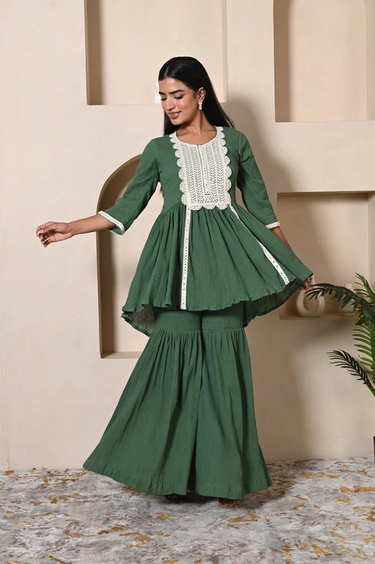 Green short kurta sharara set with heavy lace work for festival wear