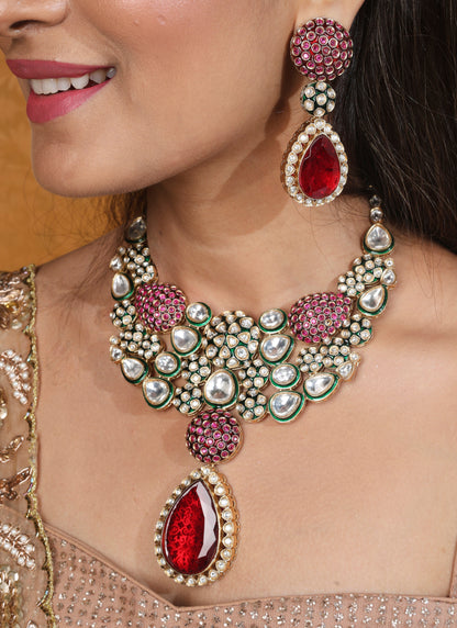 Jaipur Jadau Work Necklace Set with Red Stones Earrings and Maang Tikka in Kundan