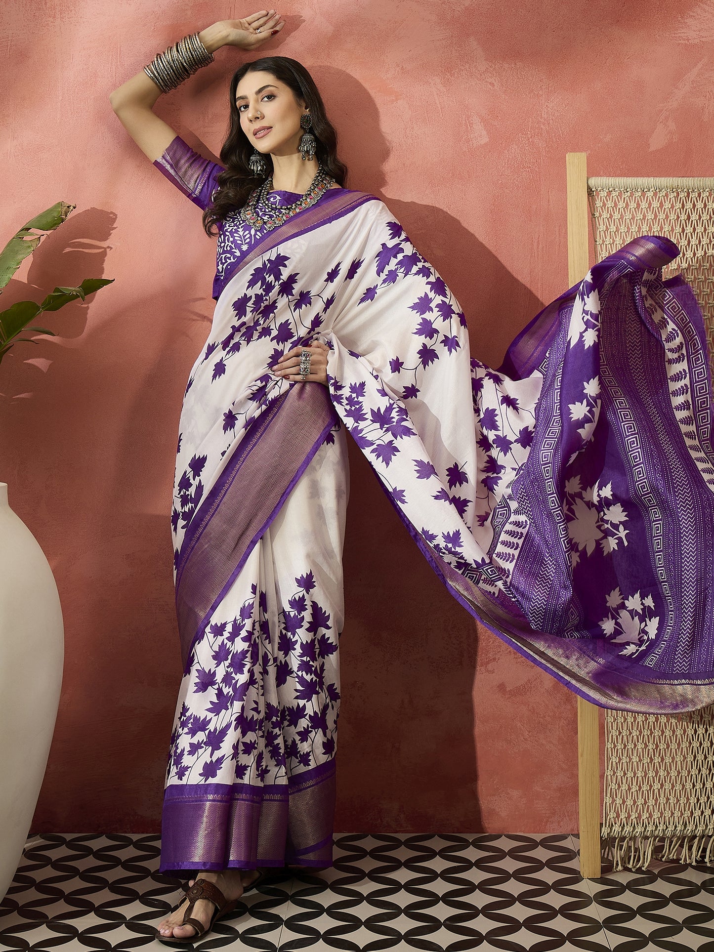 Elegant White Saree with Graceful Purple Floral Motifs